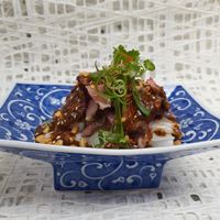 Steamed Cheong Fan, Grilled Beef, Mala Sauce, Coriander and Peanuts at $12